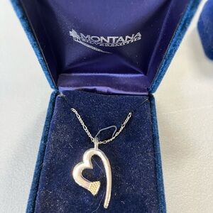 Montana Silversmith western, cowgirl, horseshoe nail open heart necklace.